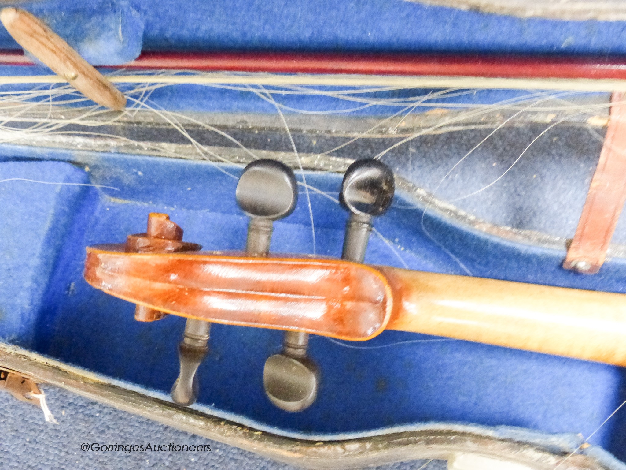 A student violin in case